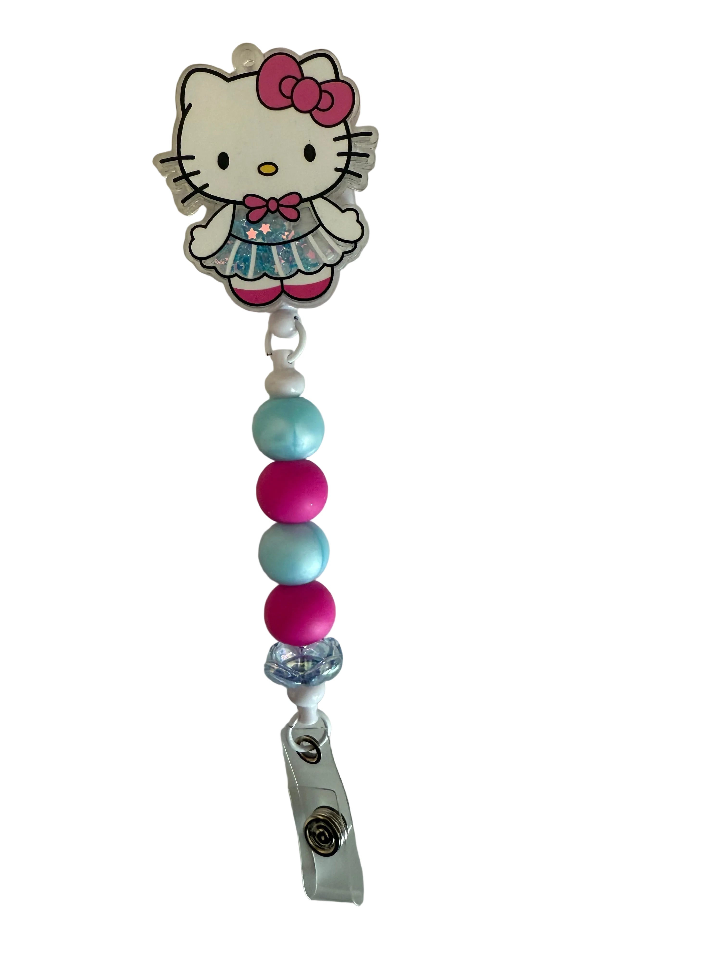 Hello Kitty Blue Dress Acrylic Shaker Badge Reel